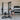 "Man exercising with Torque Tank M1 Push Sled at gym"